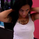 How rude! Gabi puts on the chain after digging through Mimi's luggage!