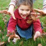 kid playing in the dirt
